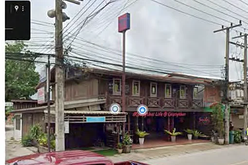 Mini Big C conversion of a heritage timber building, Chiang Khan — photo 3
